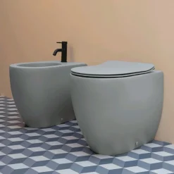 WC-istuin Lavabo Glomp pehmeästi sulkeutuvalla istuinkannella, back to wall, huuhtelukaulukseton, matta, eri värejä